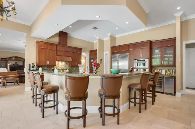 a very nice looking room with a large window and glass door