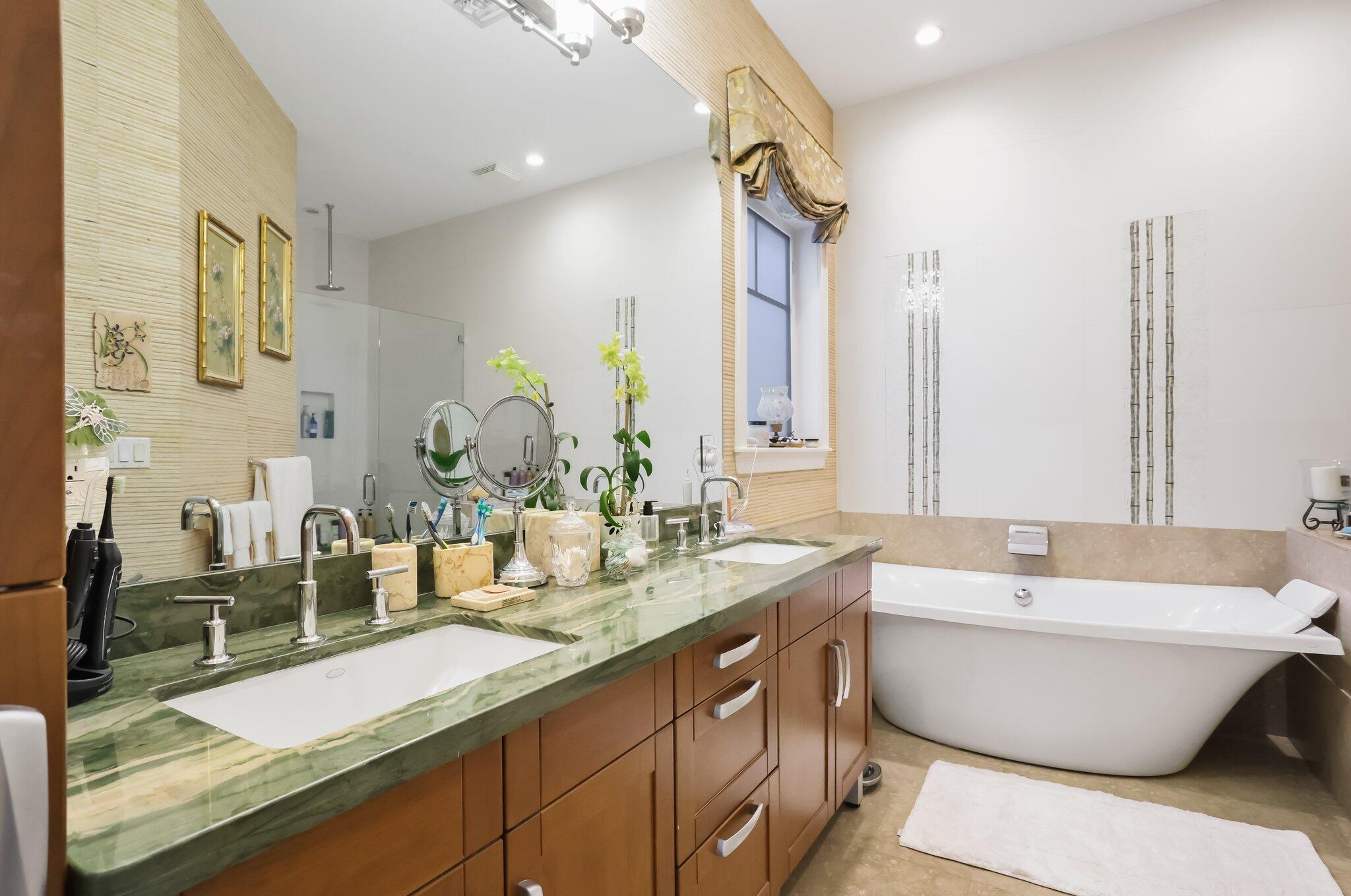 2409 Northeast 12th Street Fort Lauderdale, FL 33304 - Photo 28 of 65 a bathroom with a double vanity sink and a mirror