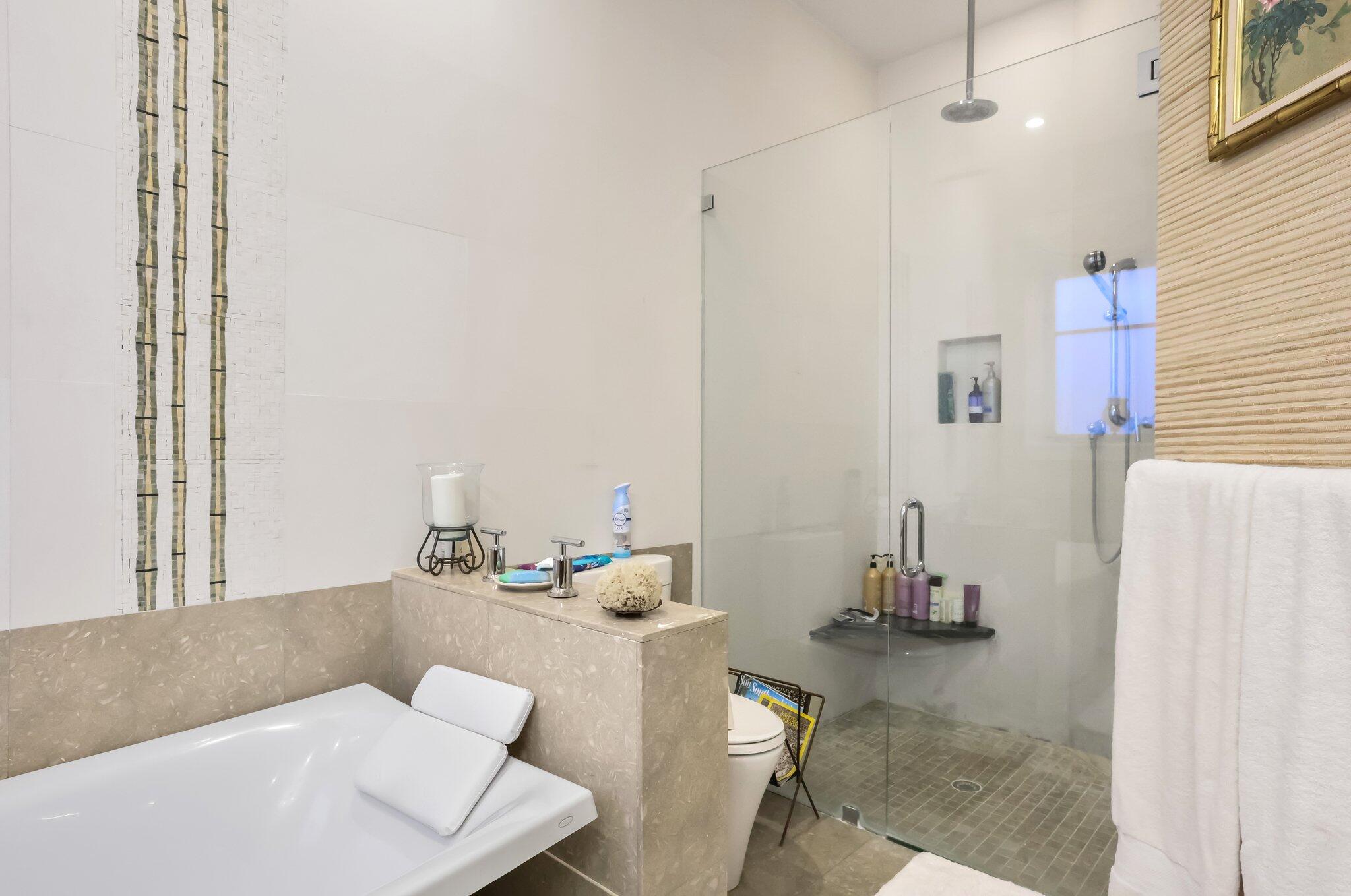 2409 Northeast 12th Street Fort Lauderdale, FL 33304 - Photo 29 of 65 a bathroom with a sink and a mirror