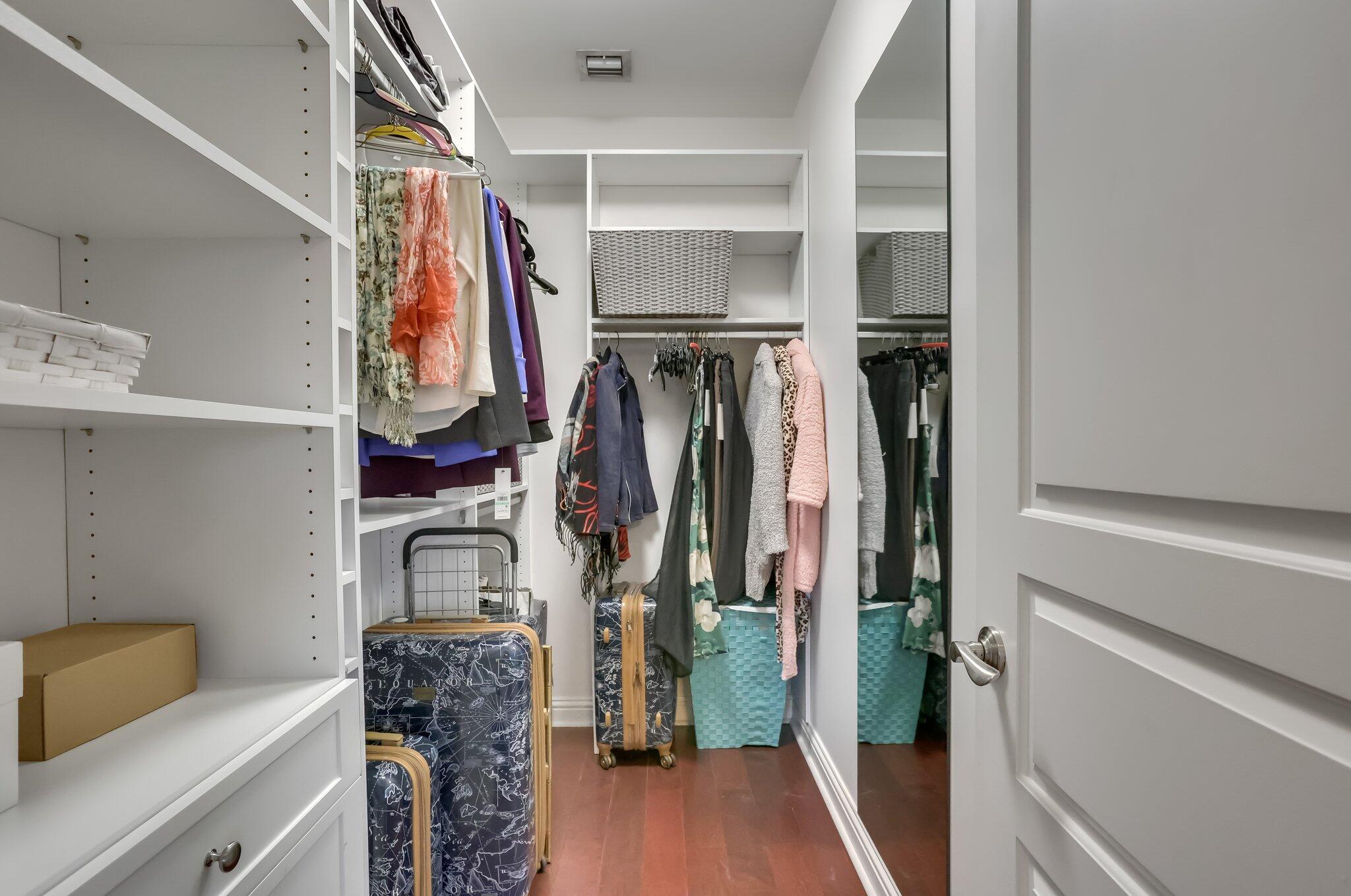 2409 Northeast 12th Street Fort Lauderdale, FL 33304 - Photo 39 of 65 a view of walk in closet with clothes and shoes
