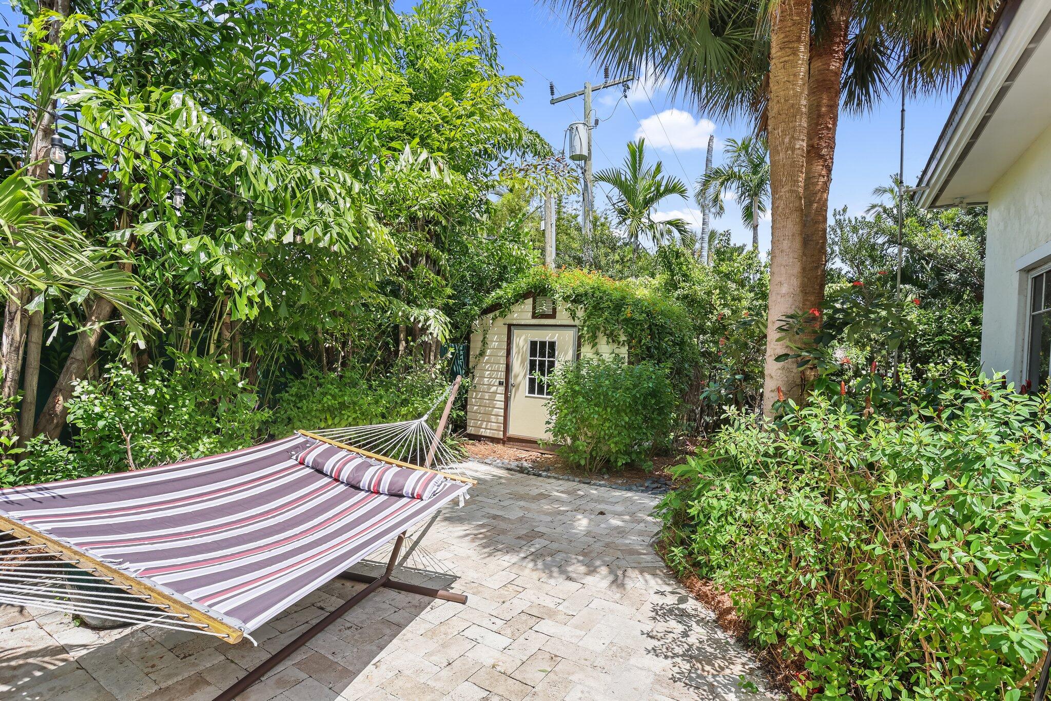 2409 Northeast 12th Street Fort Lauderdale, FL 33304 - Photo 55 of 65 a view of a backyard with sitting area