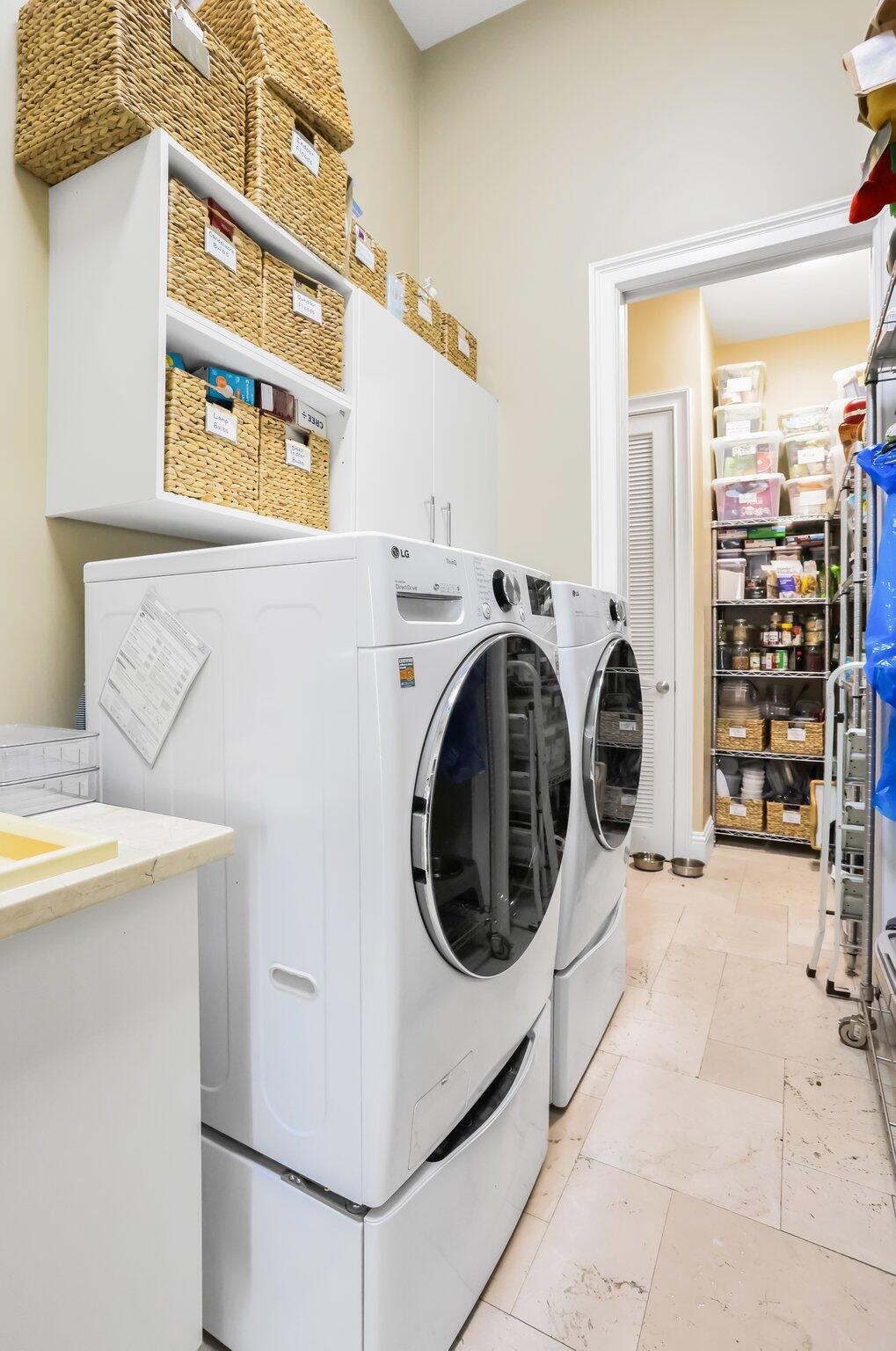 2409 Northeast 12th Street Fort Lauderdale, FL 33304 - Photo 63 of 65 a utility room with dryer and washer