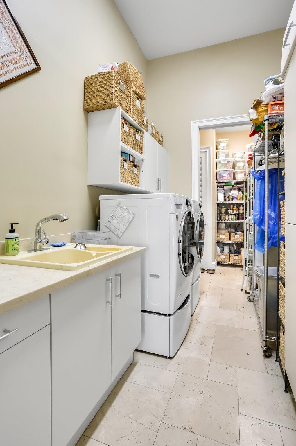 2409 Northeast 12th Street Fort Lauderdale, FL 33304 - Photo 64 of 65 a utility room with washer and dryer