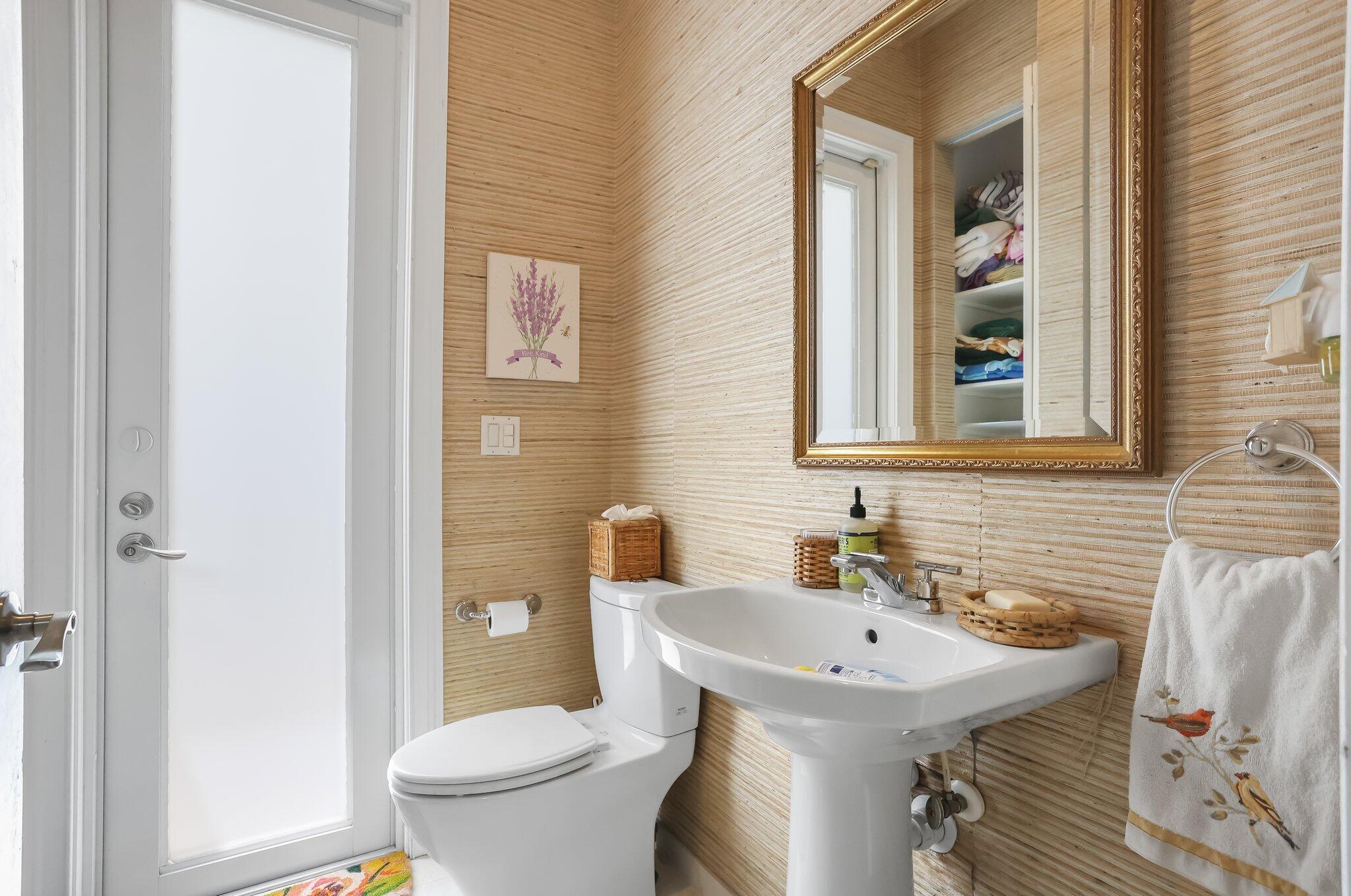 2409 Northeast 12th Street Fort Lauderdale, FL 33304 - Photo 65 of 65 a bathroom with a sink and a toilet