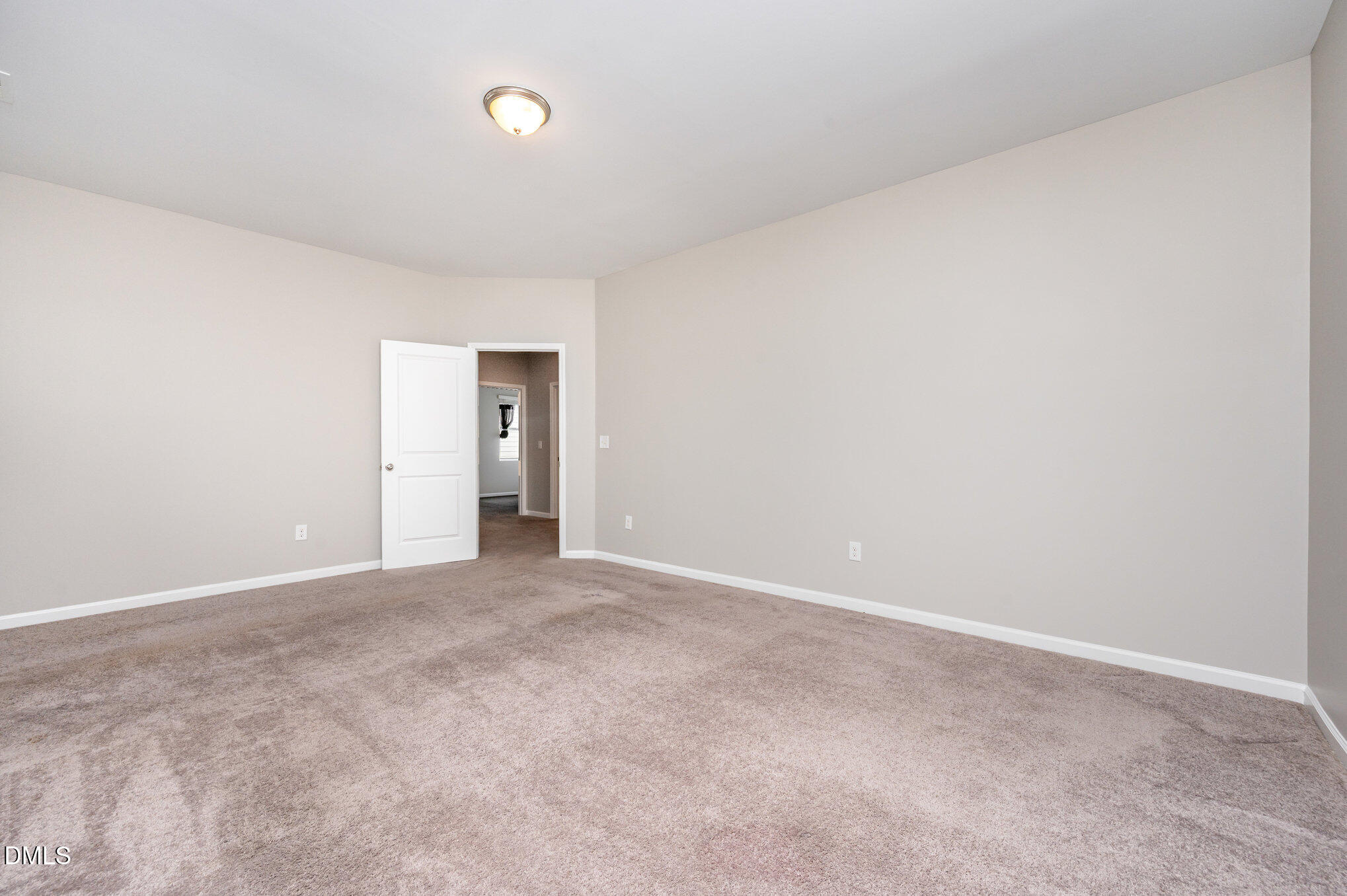 18 Dover Ridge Court Chapel Hill, NC 27517 - Photo 27 of 40 a view of an empty room with closet and a window