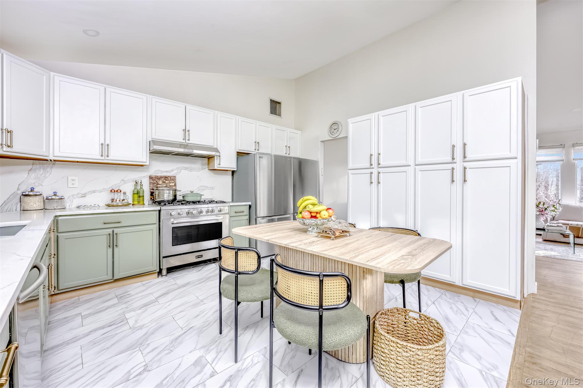 16 Old Pomona Road Suffern, NY 10901 - Photo 6 of 22 a kitchen with a table chairs sink and cabinets