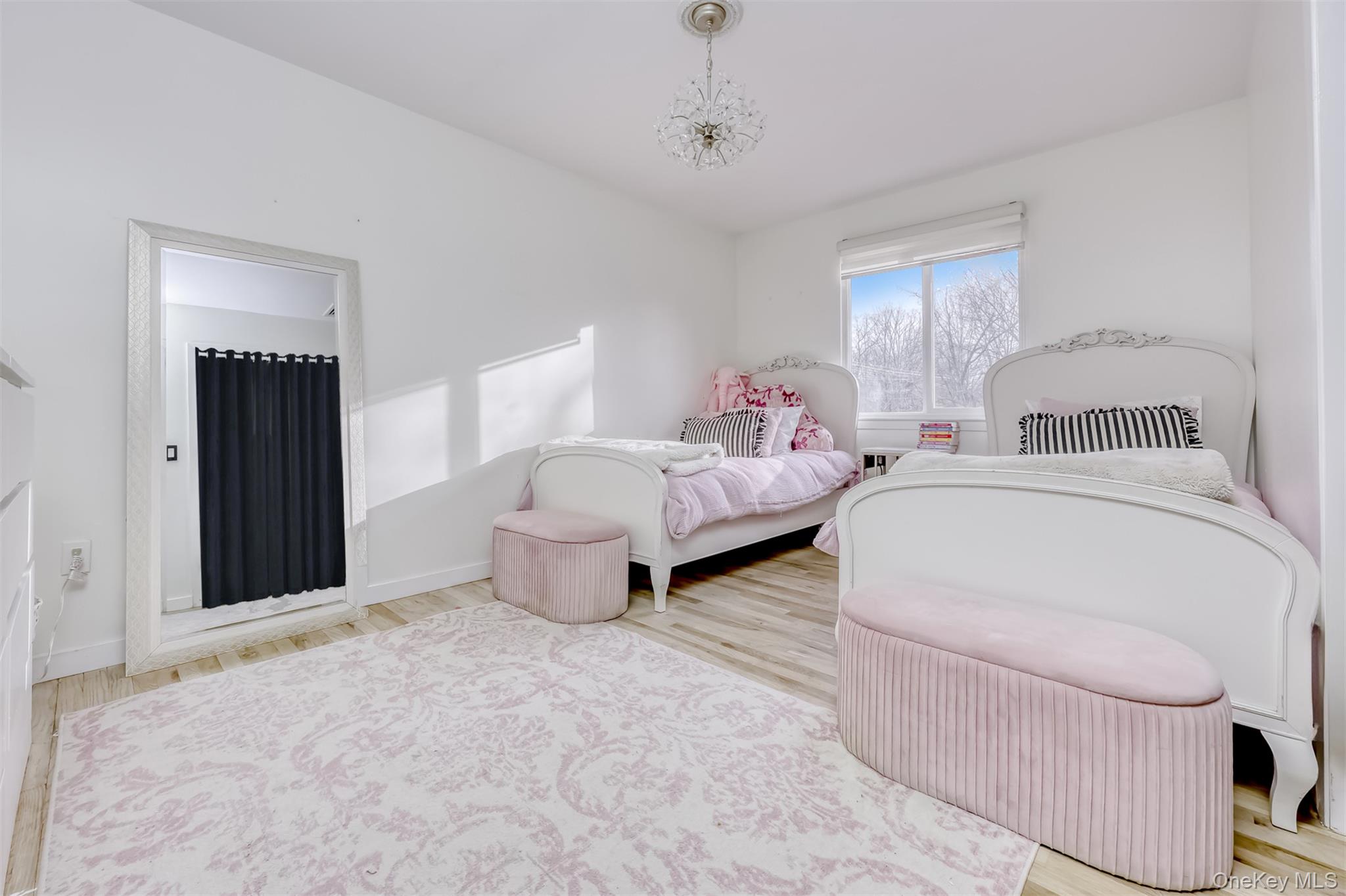 16 Old Pomona Road Suffern, NY 10901 - Photo 10 of 22 a room with two bed and a window