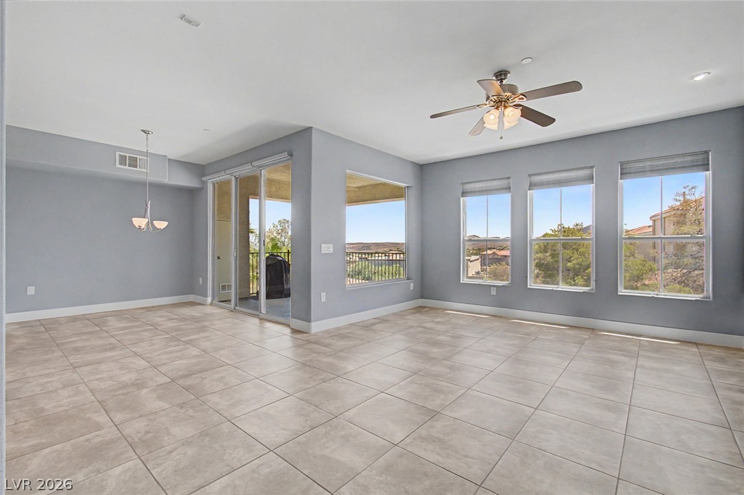 2555 Hampton Road, Unit 6308 Henderson, NV 89052 - Photo 4 of 30 Tile flooring extends throughout this generous living area, opening to your private balcony with scenic vistas.