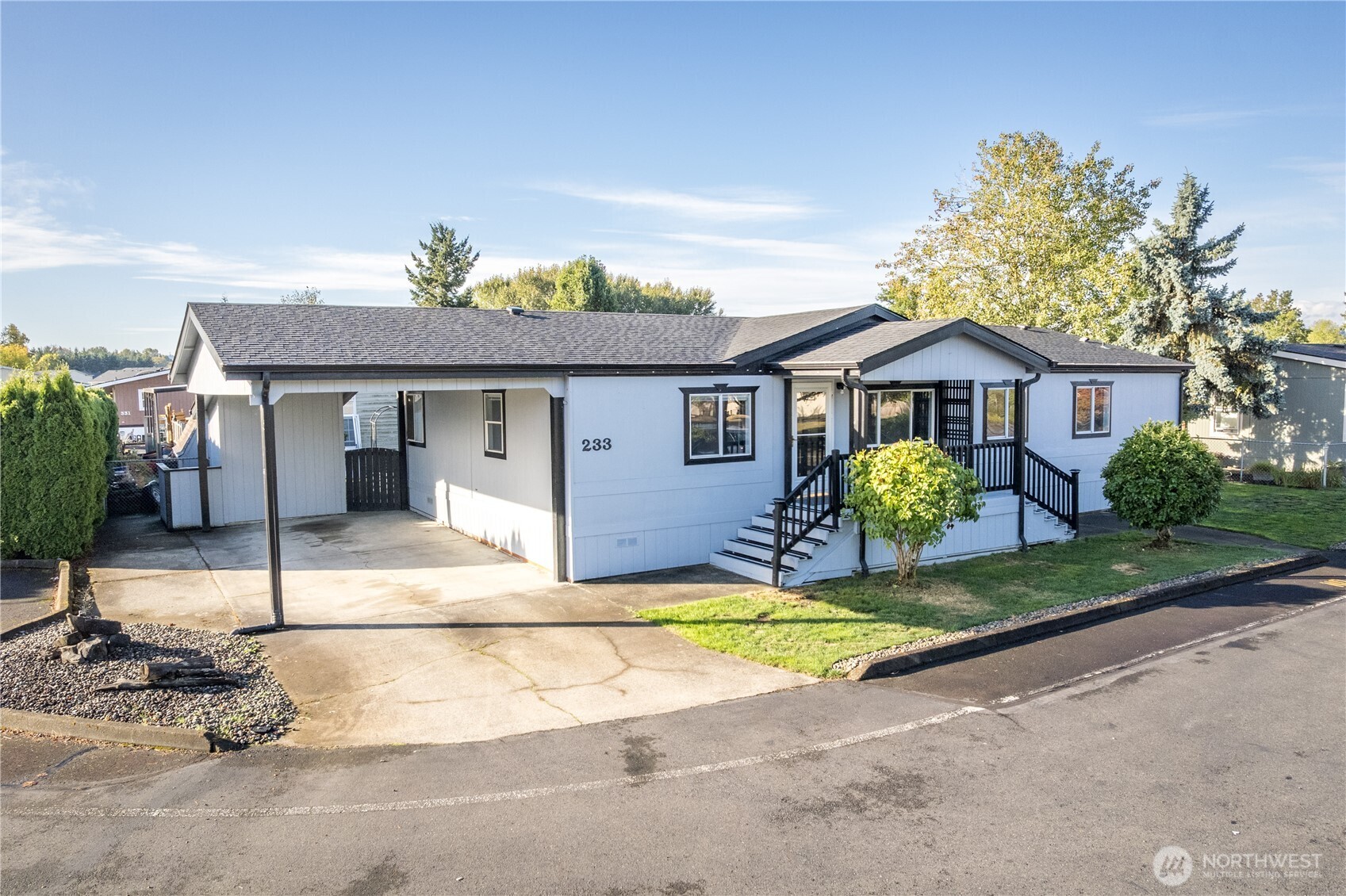233 Concord Place Longview, WA 98632 - Photo 1 of 34 a view of a house with a swimming pool and a yard