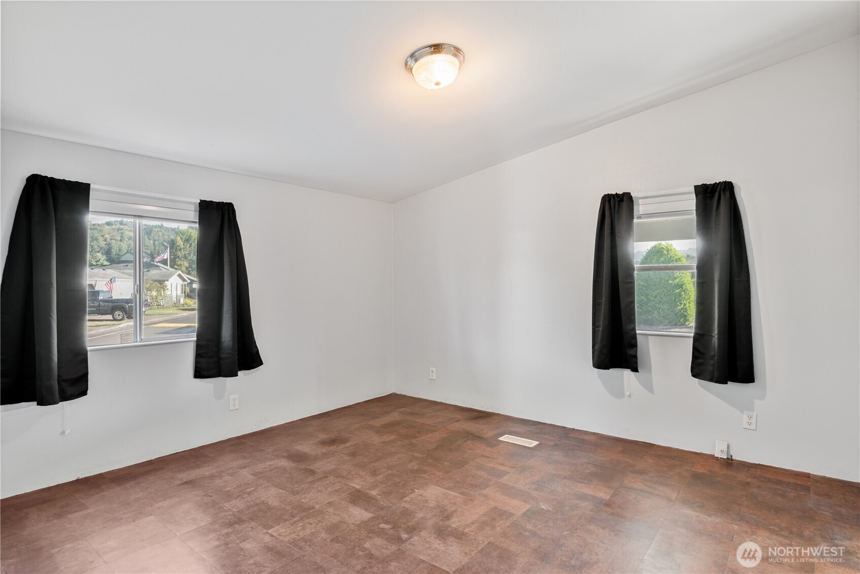 233 Concord Place Longview, WA 98632 - Photo 11 of 34 a view of a bedroom with bed and mirror