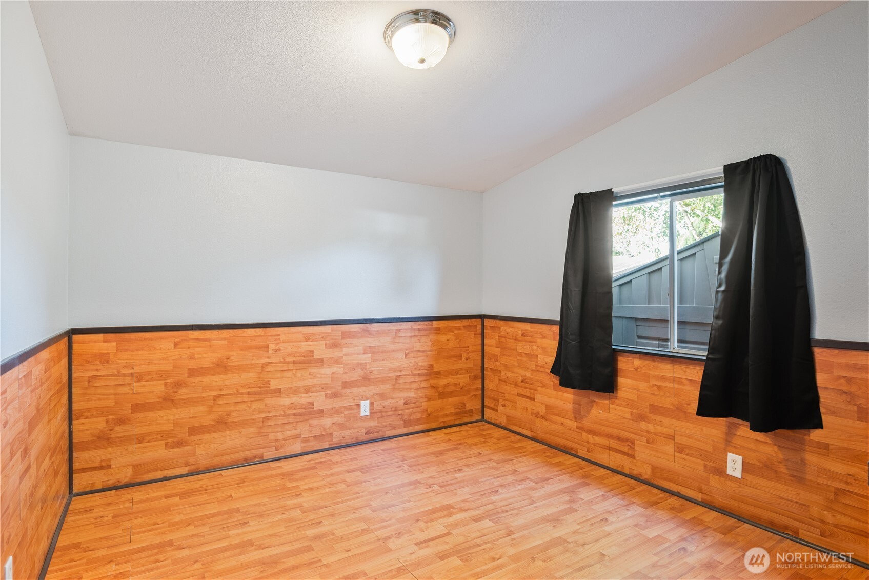 233 Concord Place Longview, WA 98632 - Photo 20 of 34 a view of a room with wooden floor and a window