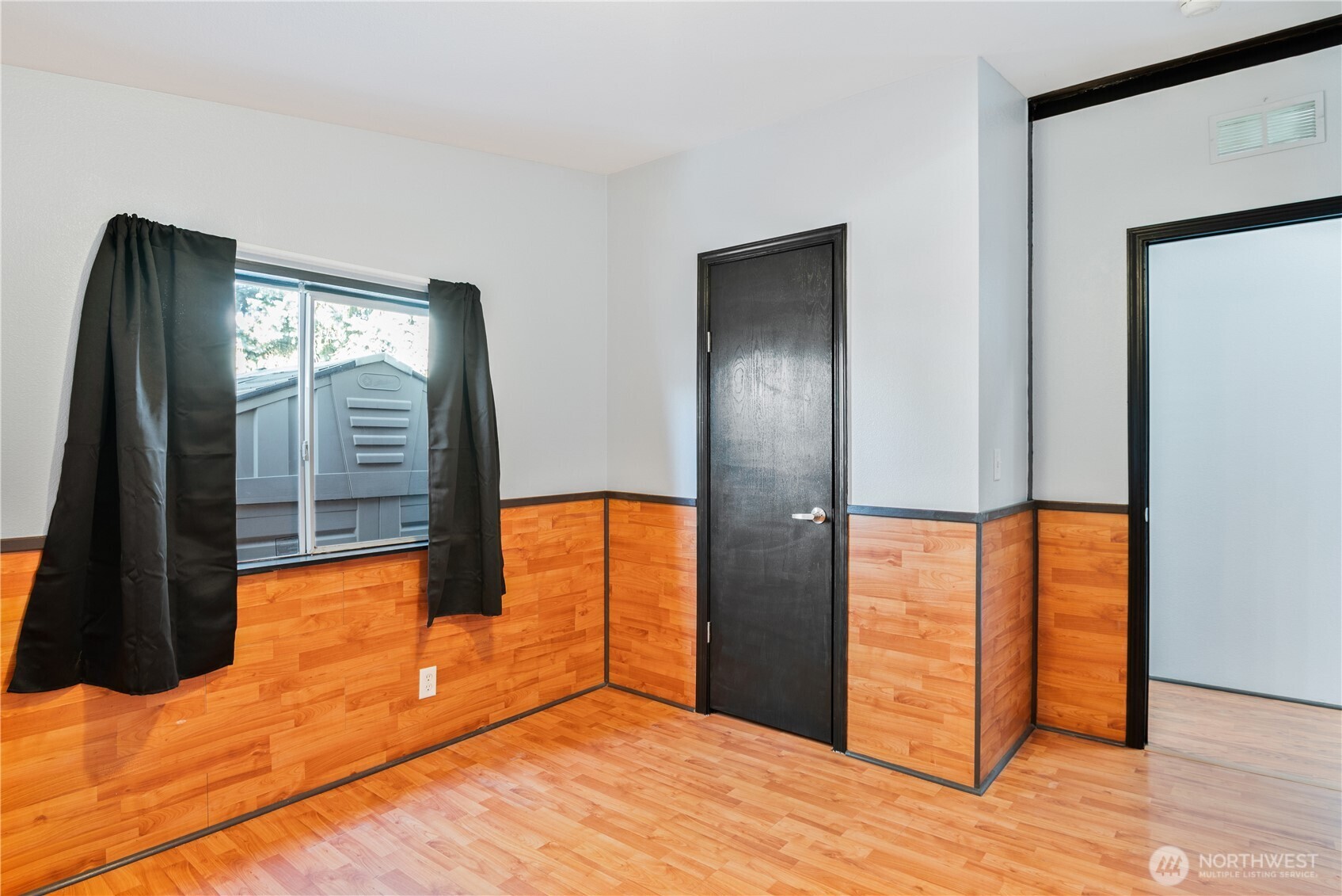 233 Concord Place Longview, WA 98632 - Photo 21 of 34 wooden floor in an empty room with a window
