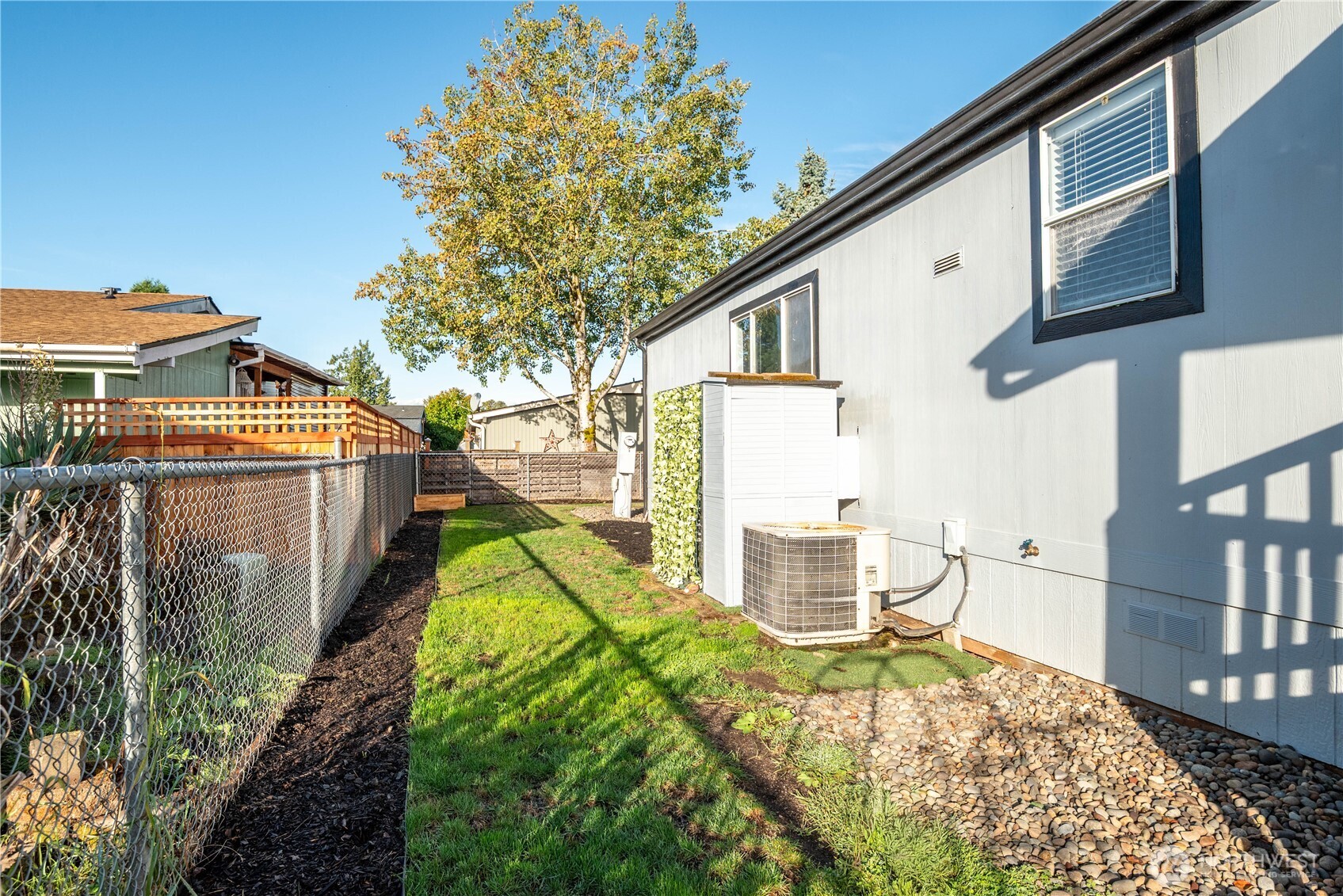 233 Concord Place Longview, WA 98632 - Photo 27 of 34 a view of a house with backyard and sitting area