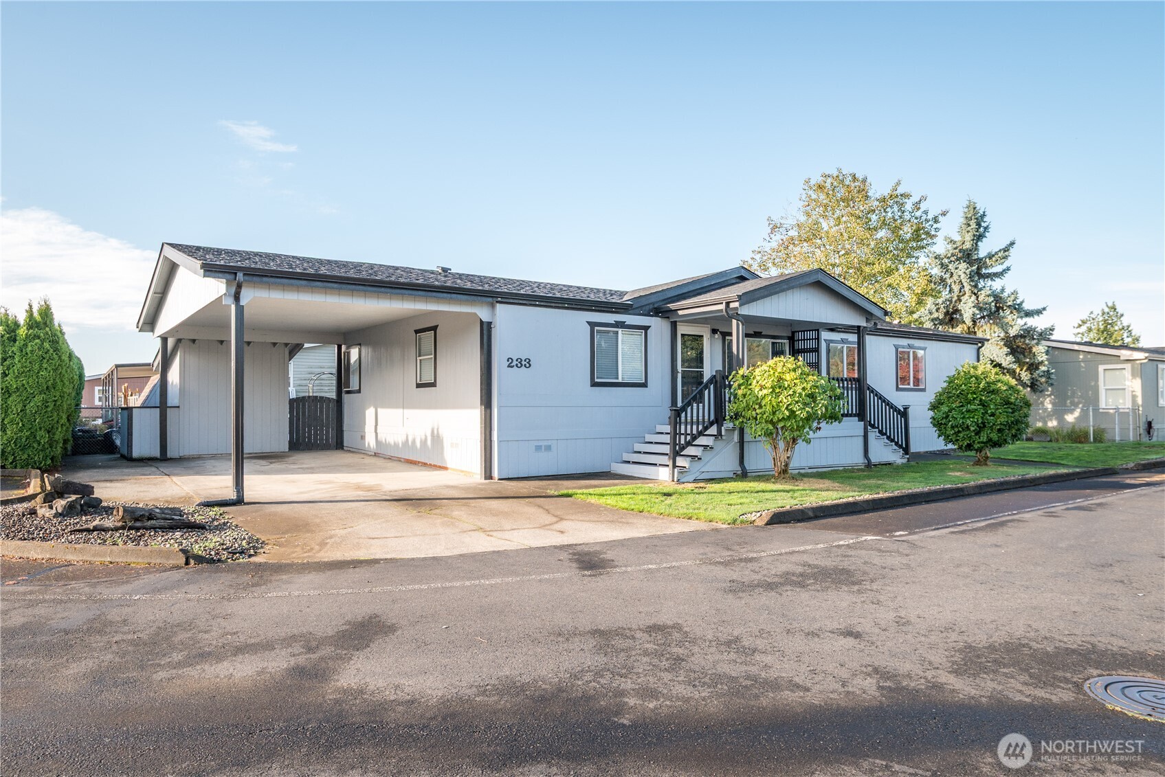 233 Concord Place Longview, WA 98632 - Photo 29 of 34 a front view of a house with a yard and garage