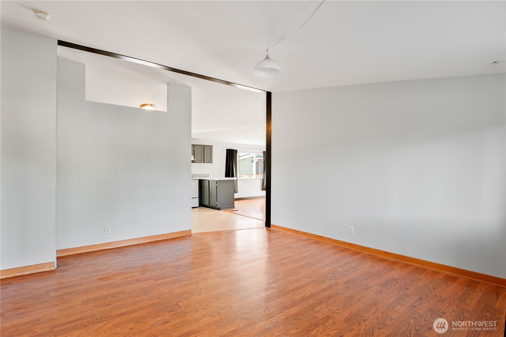 233 Concord Place Longview, WA 98632 - Photo 4 of 34 a view of empty room with wooden floor