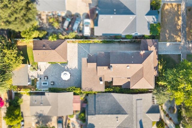 an aerial view of a house with a lake view
