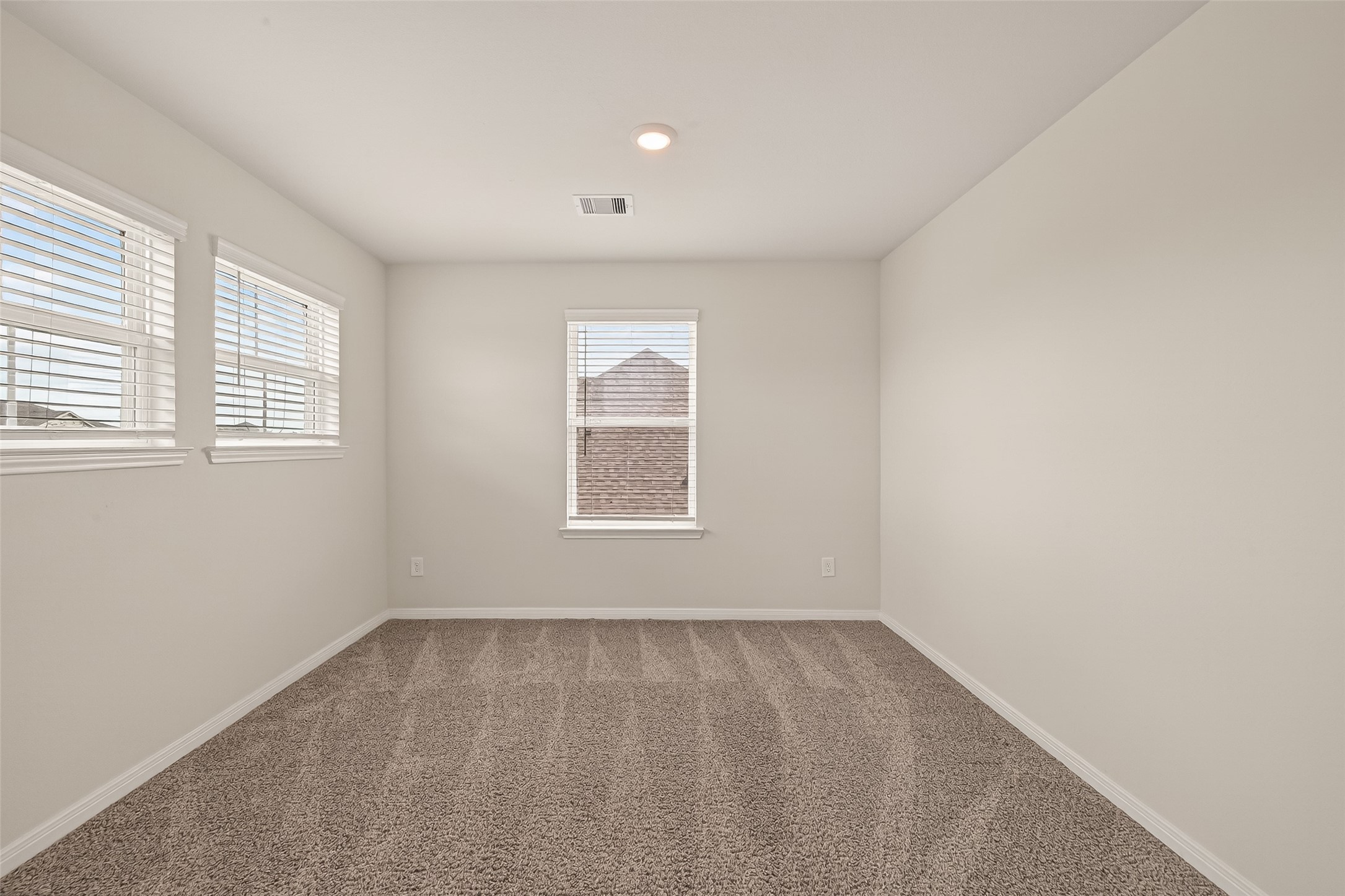 4231 Reese Ravine Lane Katy, TX 77493 - Photo 22 of 32 A look at the bonus room and all of it's windows!