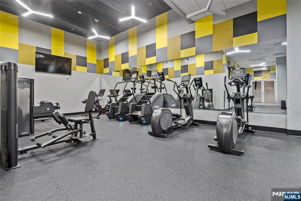 620 Bloomfield Avenue, Unit PHB Bloomfield, NJ 07003 - Photo 19 of 36 a view of a room with gym equipment