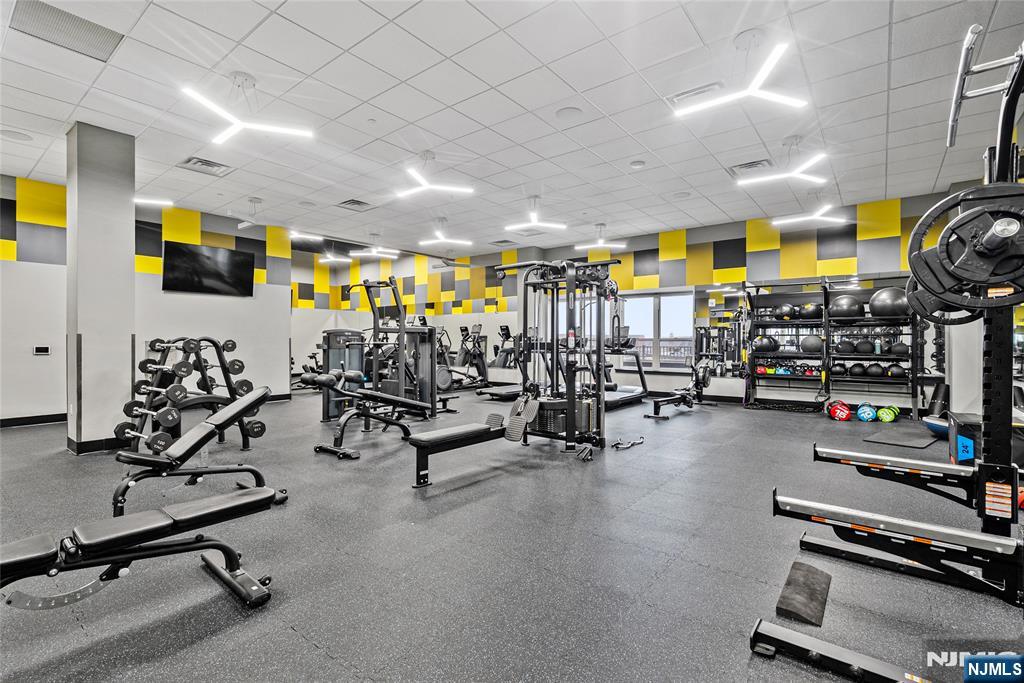 620 Bloomfield Avenue, Unit PHB Bloomfield, NJ 07003 - Photo 20 of 36 a view of a room with gym equipment