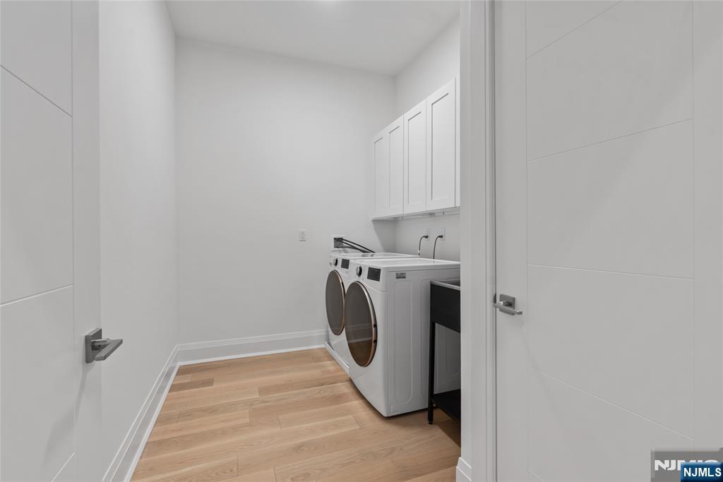 620 Bloomfield Avenue, Unit PHB Bloomfield, NJ 07003 - Photo 9 of 36 a utility room with dryer and washer