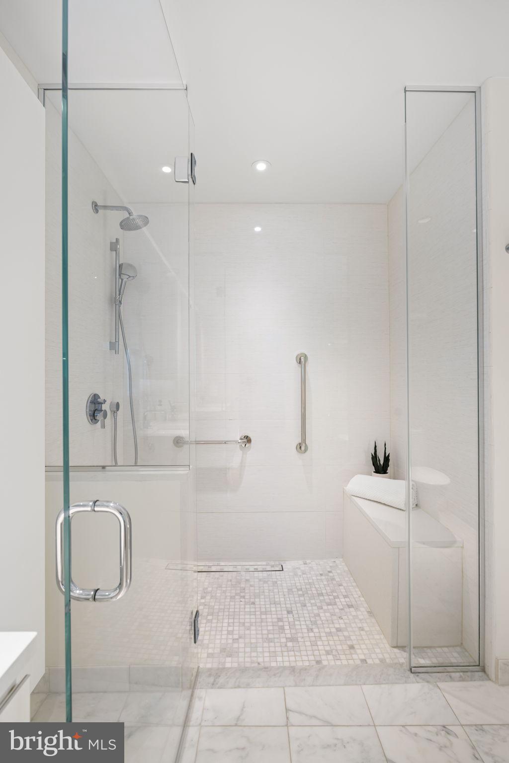 2501 M Street Northwest, Unit T04 Washington, DC 20037 - Photo 14 of 24 a bathroom with a bathtub and a shower