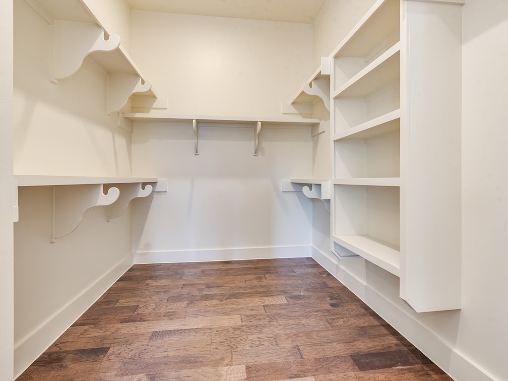 6412 Carson Ridge, Unit B Austin, TX 78741 - Photo 12 of 29 a view of a room with racks on the wall