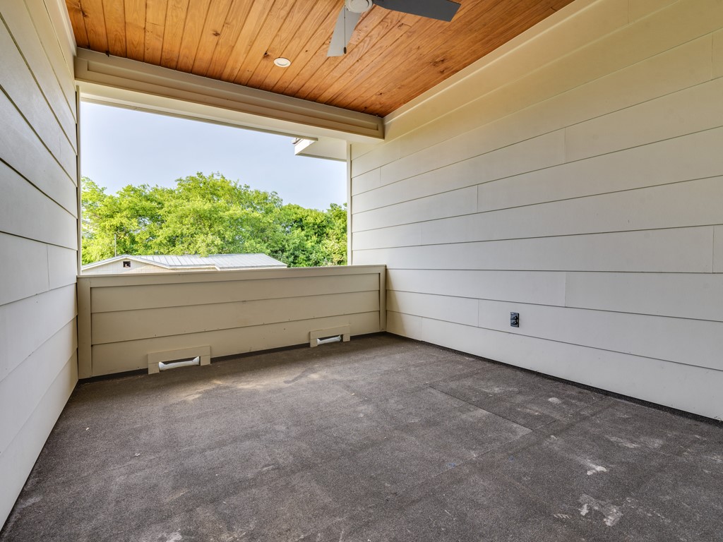 6412 Carson Ridge, Unit B Austin, TX 78741 - Photo 21 of 29 Covered outdoor patio with a wood-plank ceiling, recessed lighting, and a ceiling fan