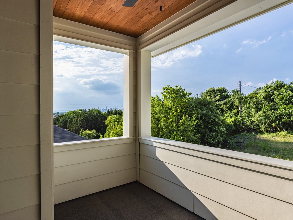 6412 Carson Ridge, Unit B Austin, TX 78741 - Photo 23 of 29 a view of a glass door and a window