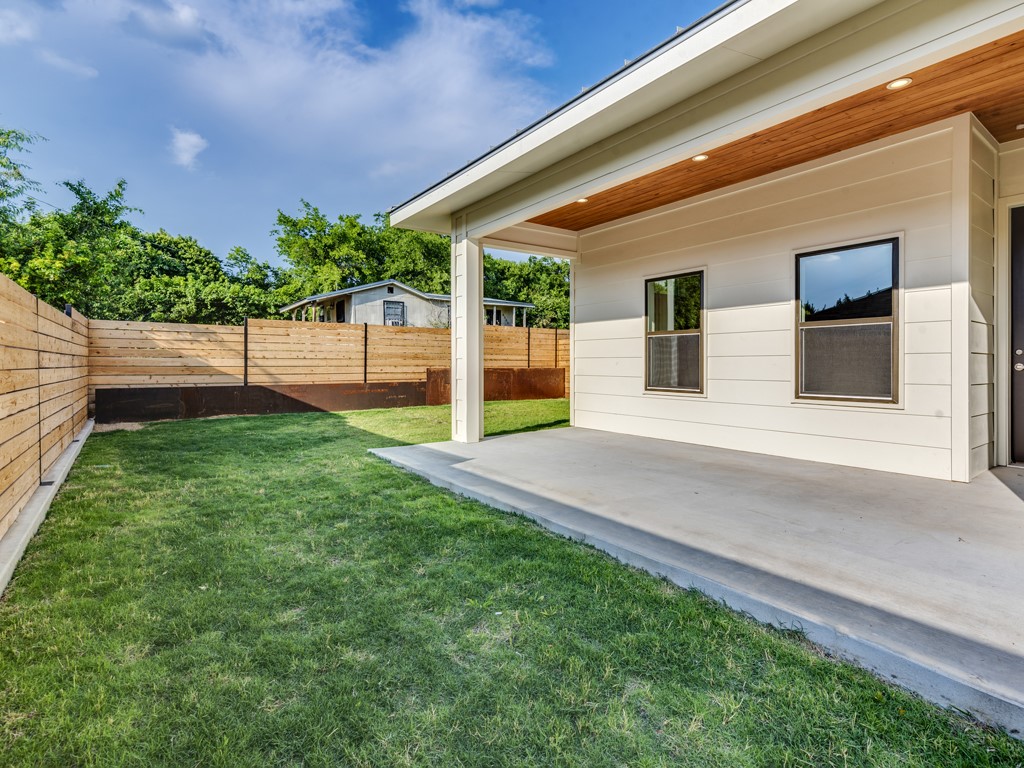 6412 Carson Ridge, Unit B Austin, TX 78741 - Photo 24 of 29 a porch with a bench in front of it