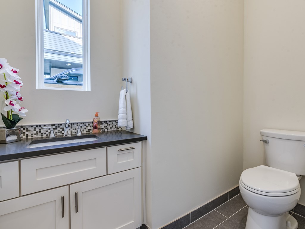 6412 Carson Ridge, Unit B Austin, TX 78741 - Photo 7 of 29 a bathroom with a sink and a toilet