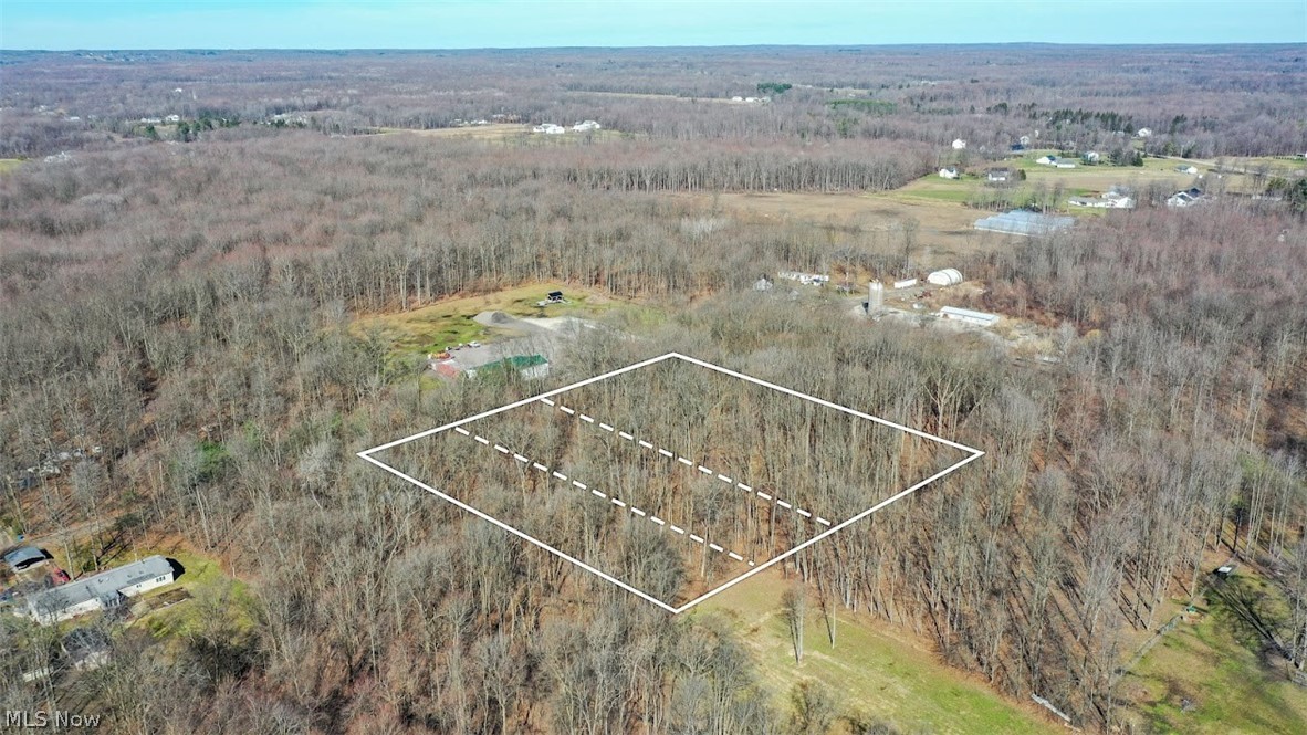 Rockwood Road Windsor, OH 44099 - Photo 12 of 19 Aerial view of property and surrounding area featuring a heavily wooded area and property boundaries highlighted
