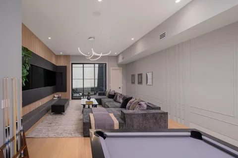 a kitchen with stainless steel appliances a refrigerator and a sink