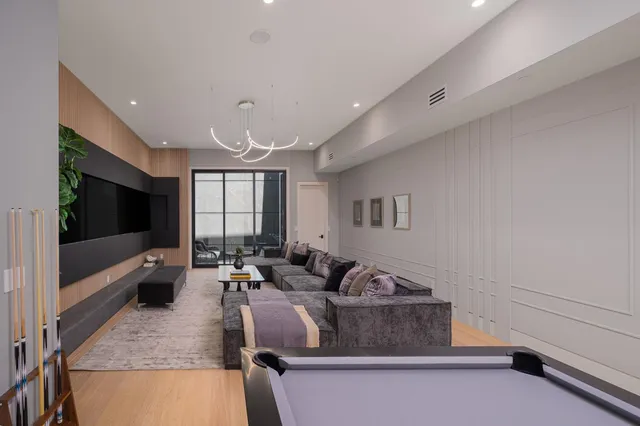 a kitchen with stainless steel appliances a refrigerator and a sink