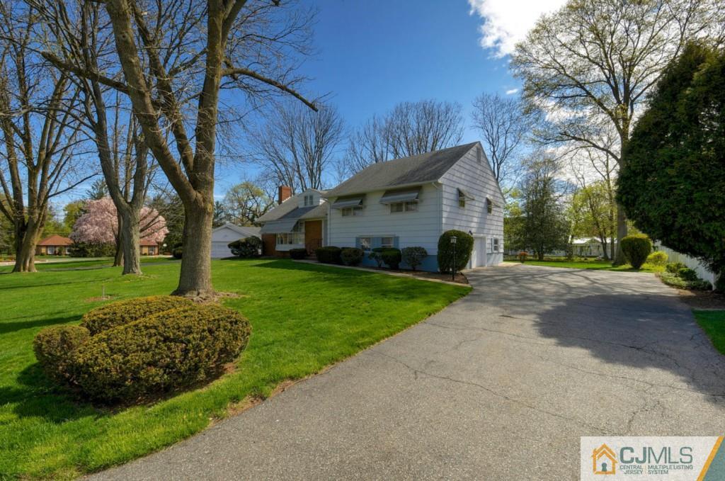 11 Stafford Road Colonia, NJ 07067 - Photo 2 of 25 a view of a house with a back yard