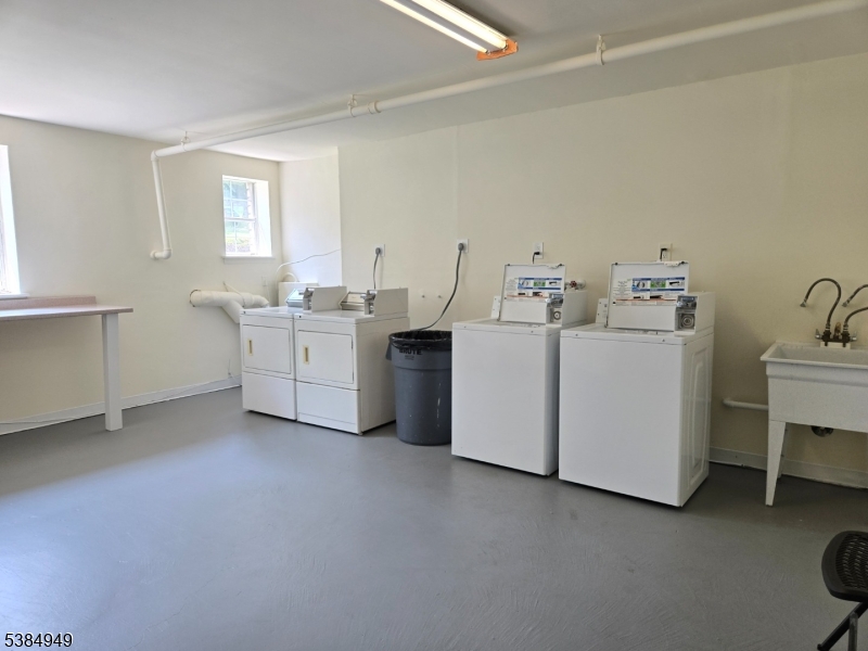1041 Ridge Street, Unit A6 Phillipsburg, NJ 08865 - Photo 16 of 19 a utility room with dryer and washer