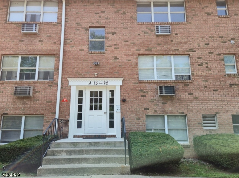 1041 Ridge Street, Unit A6 Phillipsburg, NJ 08865 - Photo 2 of 19 a front view of a house with a garden