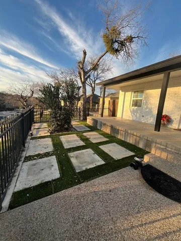 a view of a porch with furniture