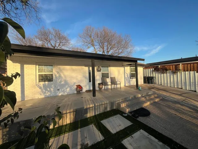 a view of swimming pool with outdoor seating