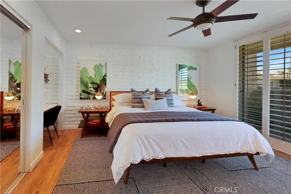 a bedroom with a bed and furniture