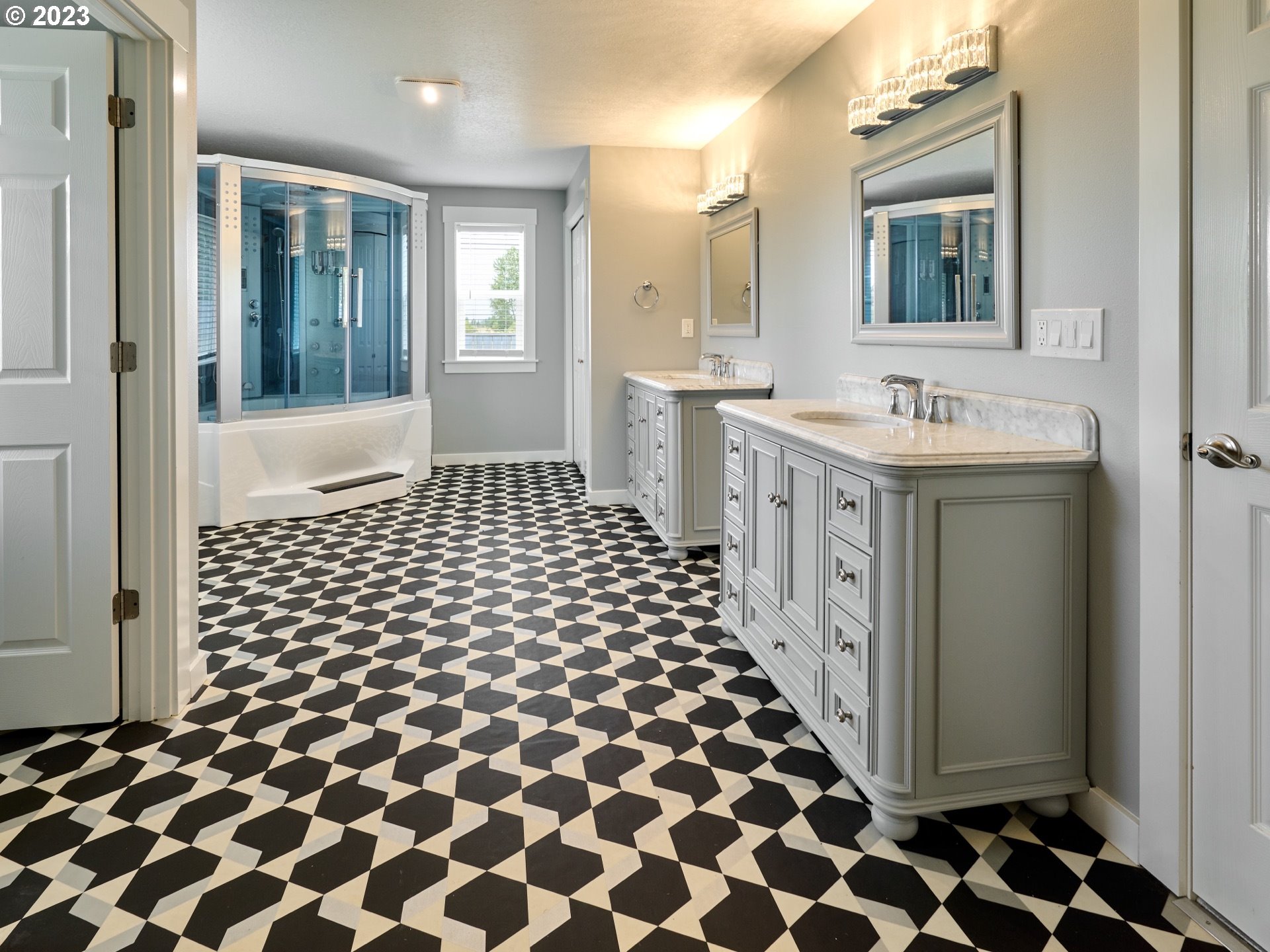 1185 Cordon Road Northeast Salem, OR 97317 - Photo 7 of 15 a bathroom with a sink a mirror a vanity and a shower