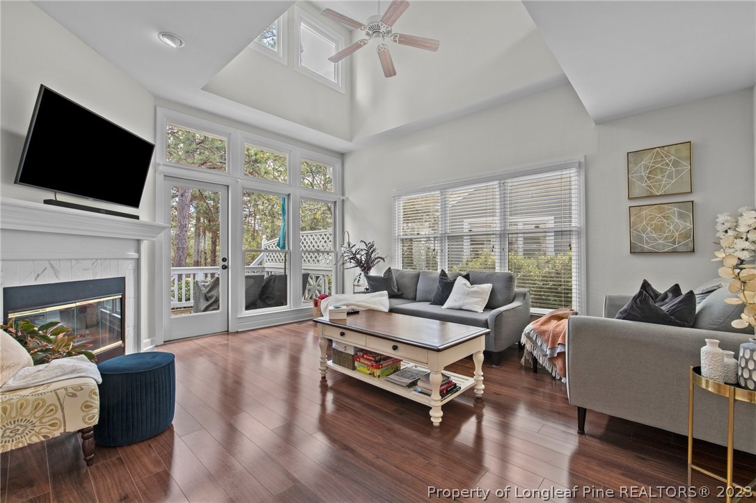 269 Knoll Road, Unit 409 Southern Pines, NC 28387 - Photo 13 of 40 a living room with furniture fireplace and flat screen tv