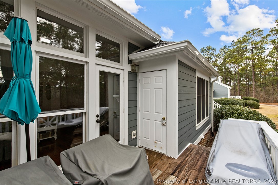 269 Knoll Road, Unit 409 Southern Pines, NC 28387 - Photo 33 of 40 a view of balcony with furniture and garden