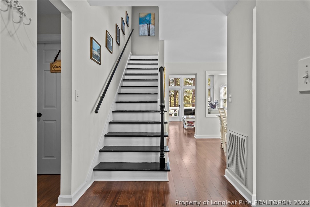 269 Knoll Road, Unit 409 Southern Pines, NC 28387 - Photo 5 of 40 a view of entryway and hall with wooden floor