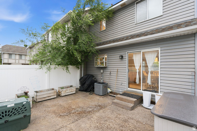 1099 South 950 East, Unit 17 Provo, UT 84606 - Photo 17 of 23 Private outdoor patio area with white vinyl fencing