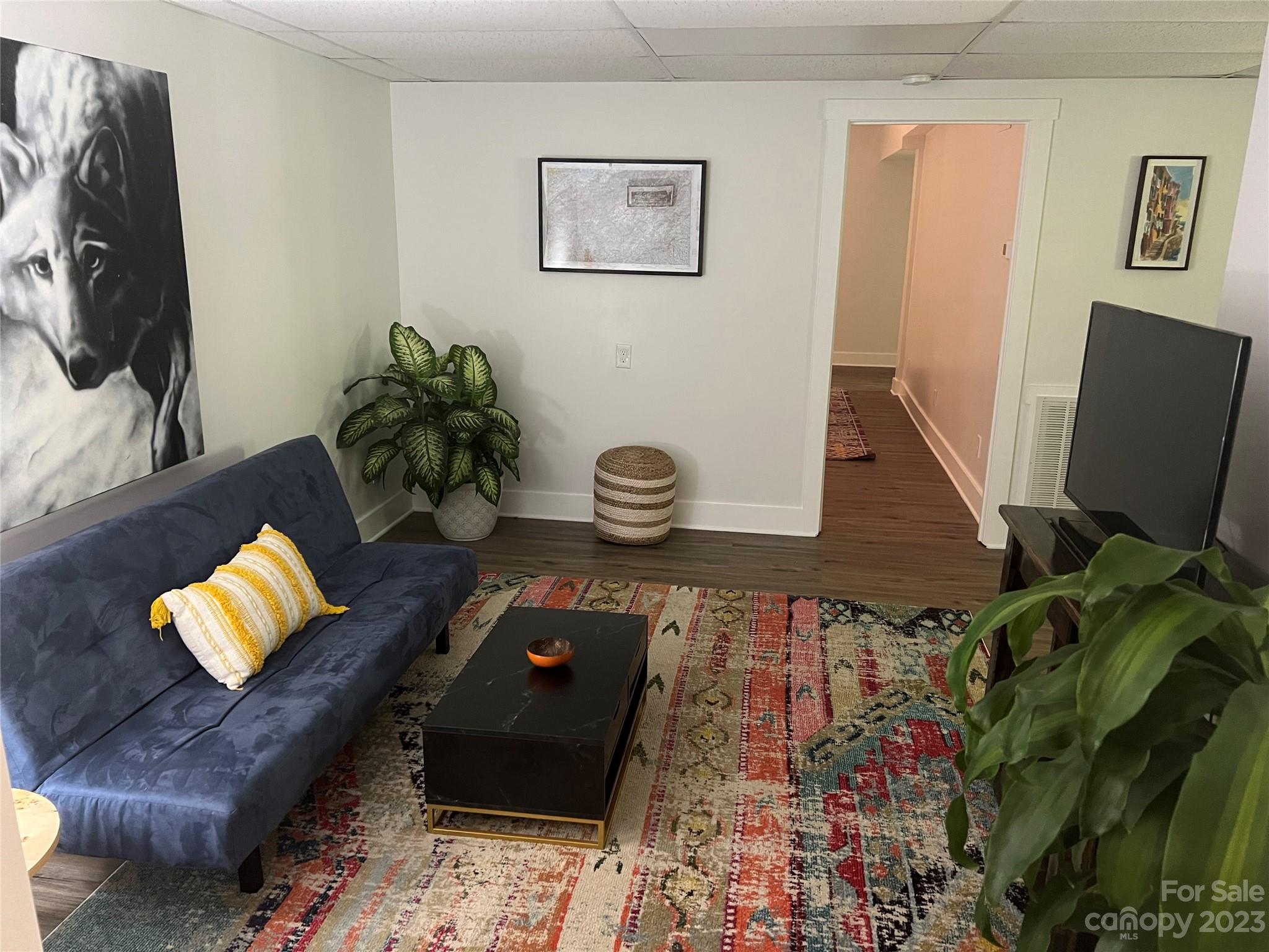 39 Cedar Mountain Road Asheville, NC 28803 - Photo 32 of 35 a picture of a living room with a couch