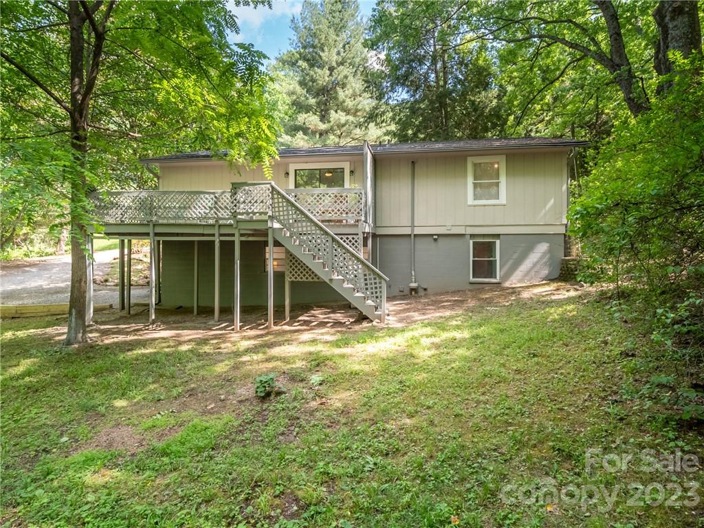 39 Cedar Mountain Road Asheville, NC 28803 - Photo 7 of 35 a house with yard in front of it