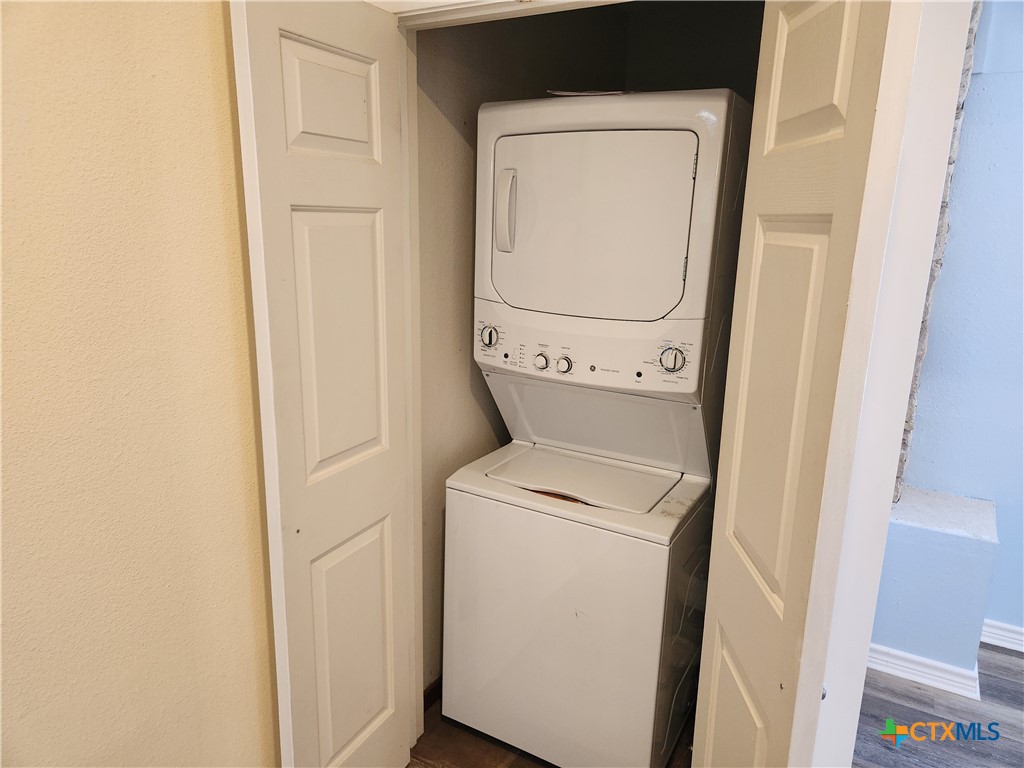 1015 Old Mill Road, Unit 4A Salado, TX 76571 - Photo 14 of 17 a utility room with dryer and washer
