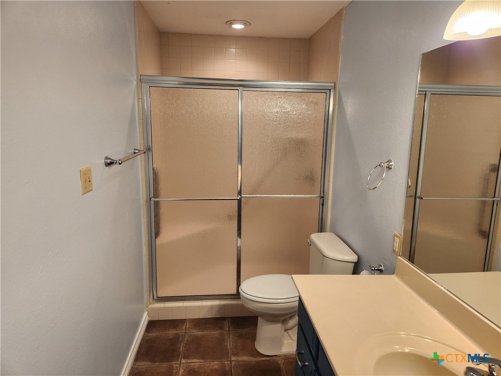 1015 Old Mill Road, Unit 4A Salado, TX 76571 - Photo 5 of 17 a bathroom with a toilet and a shower