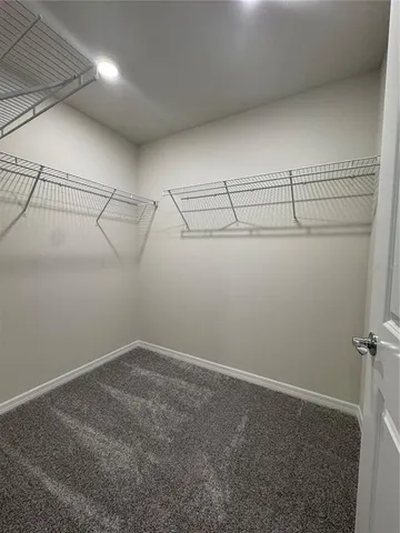 a view of a room with racks on the wall