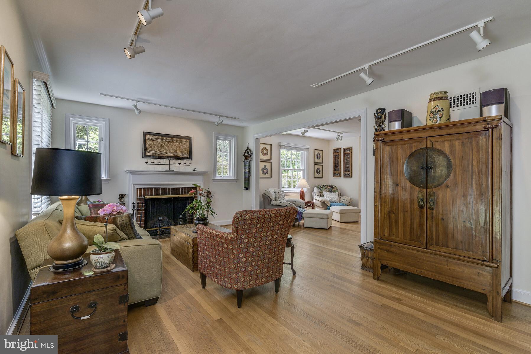 6002 Cobalt Road Bethesda, MD 20816 - Photo 13 of 38 Living room w wood-burning fireplace.